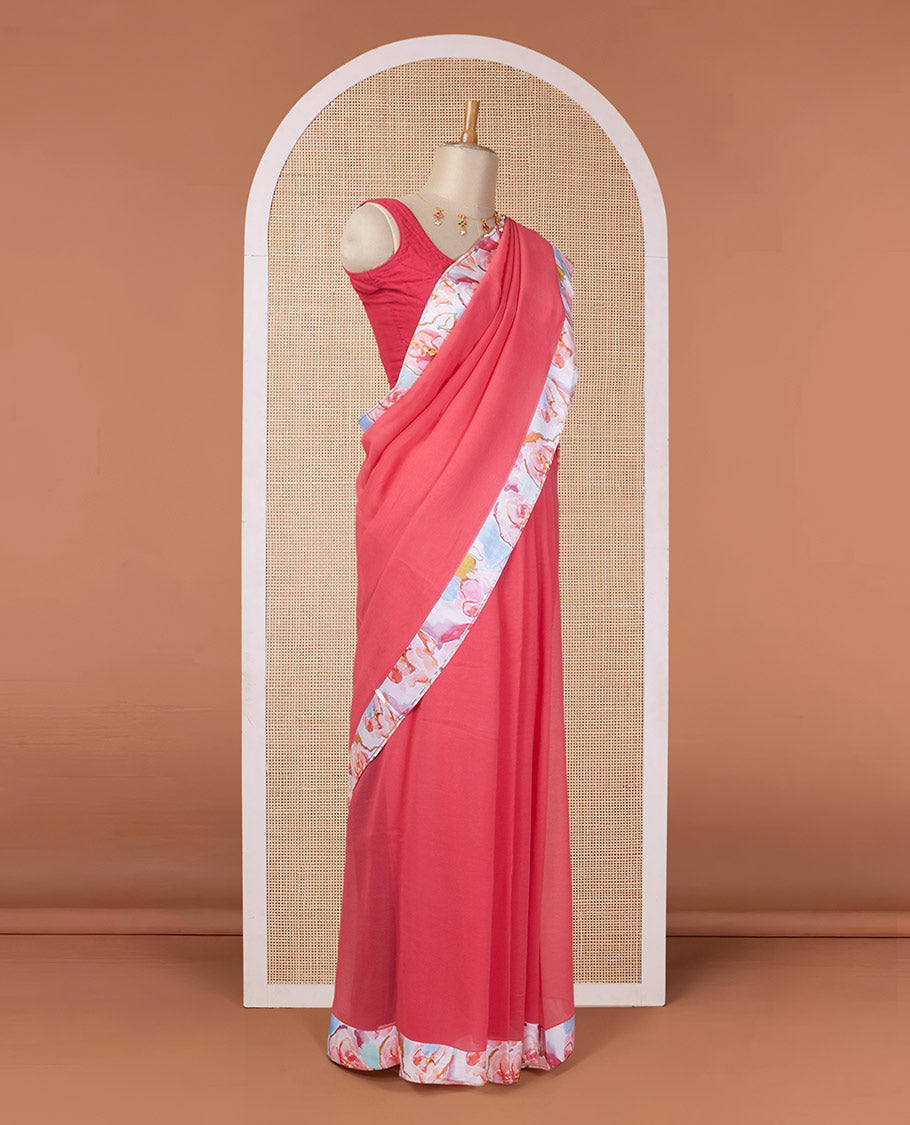 Red plain pure chiffon saree with a contrast abstract-style colors printed patch border & zari striped pallu