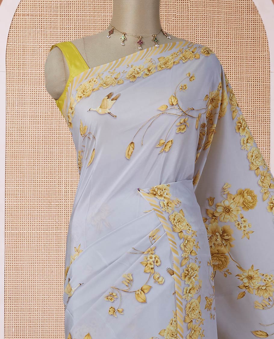 Grey digitally printed pure crepe saree with yellow floral & bird motifs & slanting stripes printed border