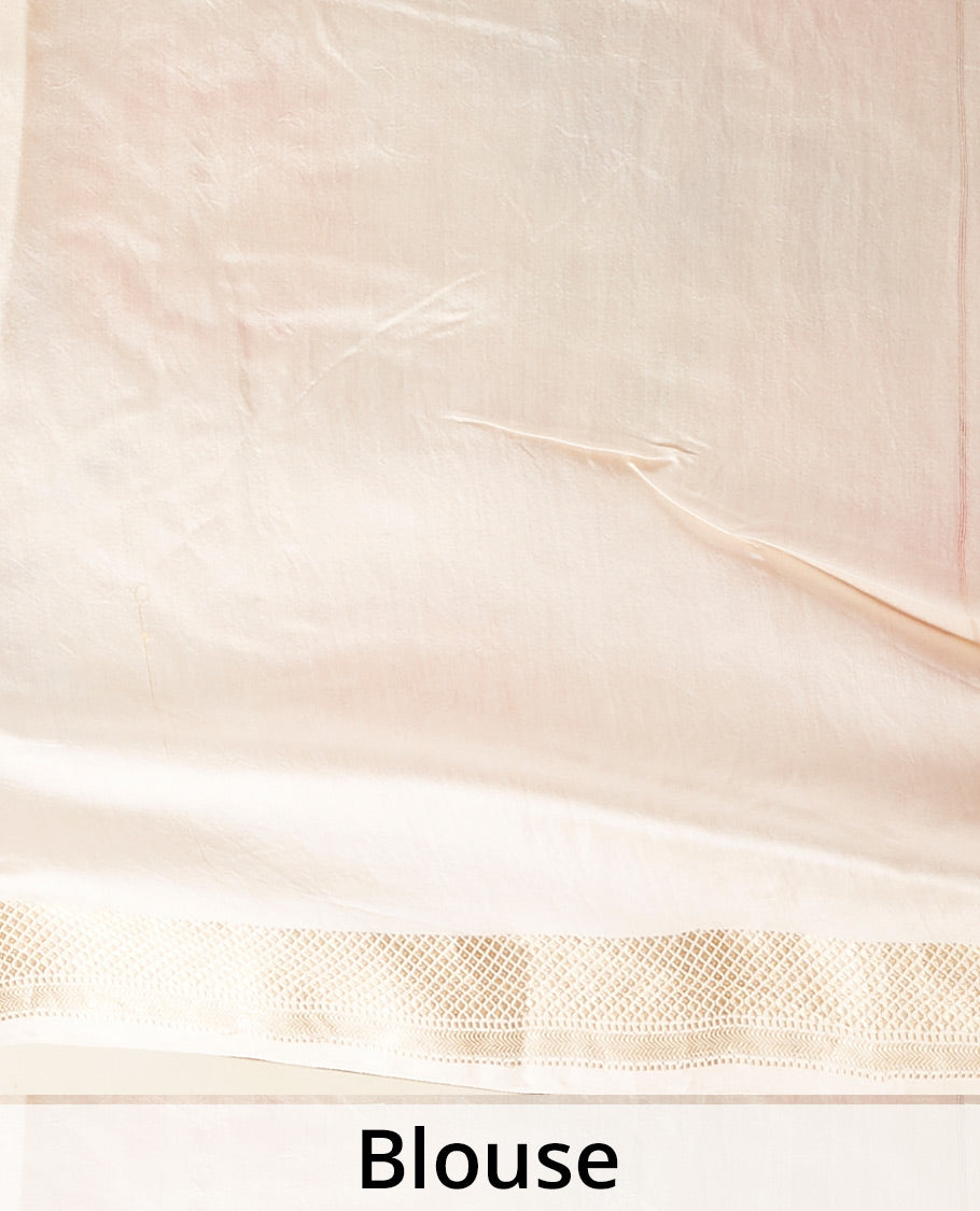 Cream base chiniya silk saree with multi-color, uniquely-shaped floral prints, traditional zari design border
