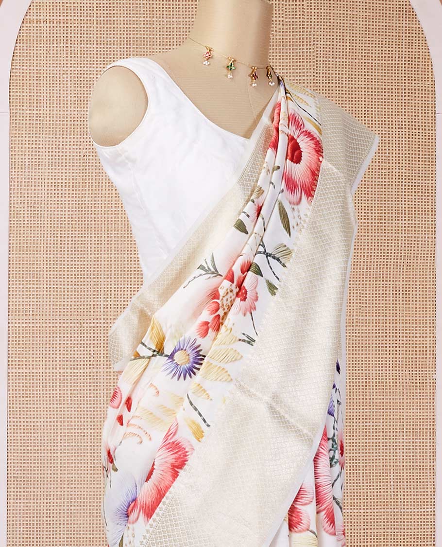 Cream digital printed chiniya silk saree with colorful floral motifs, traditional zari border & zari pallu