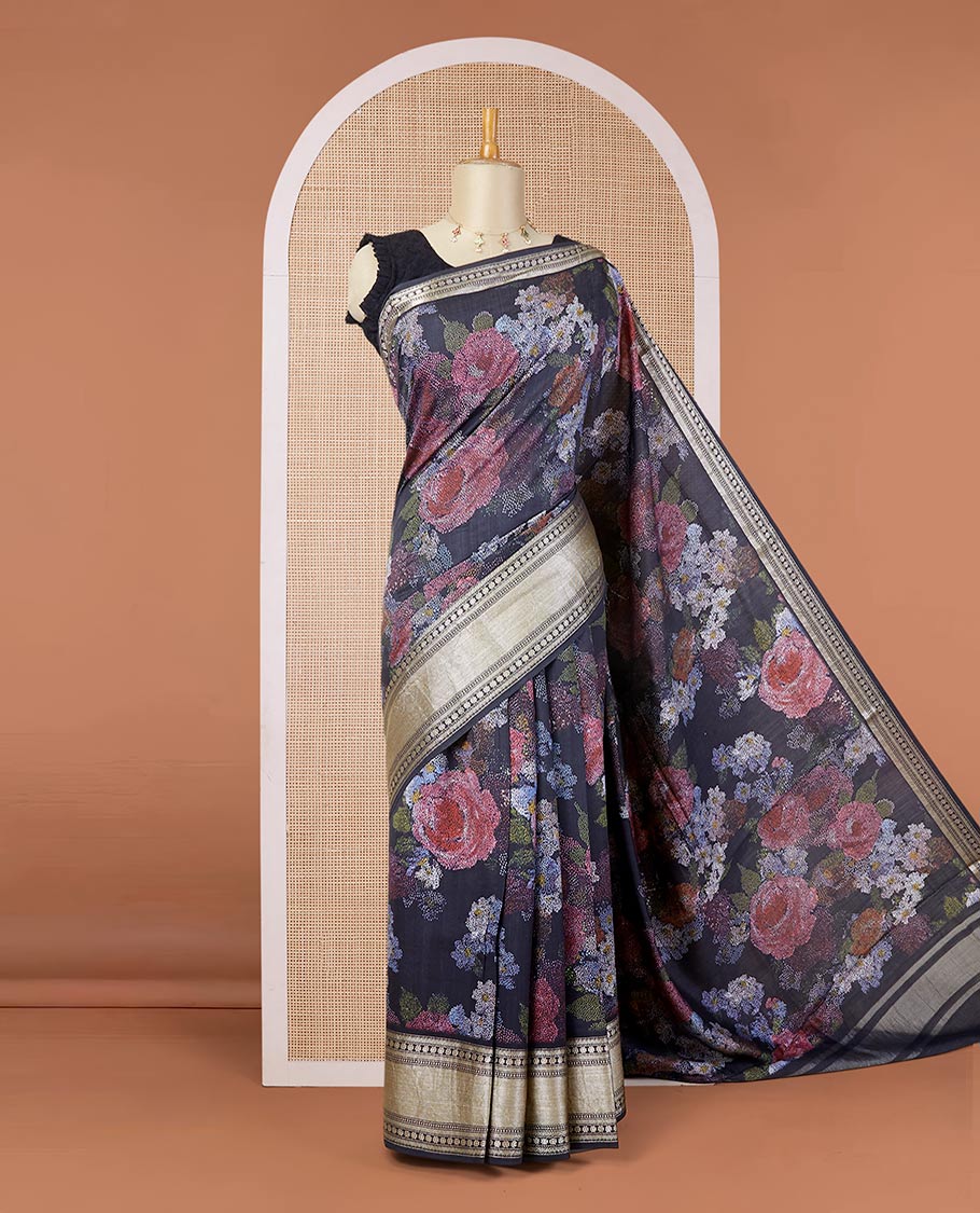 Black printed chiniya silk saree with colorful floral motifs, traditional zari design border