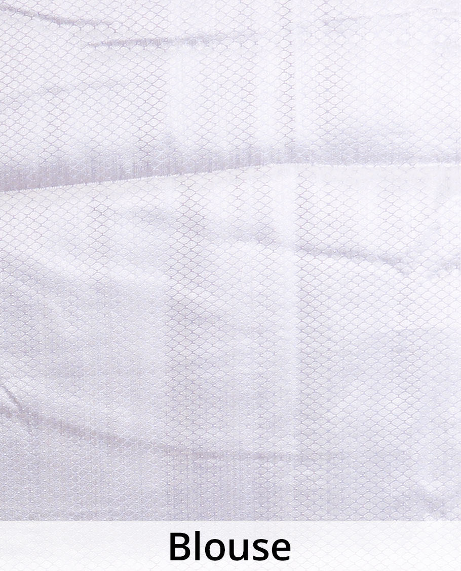 Half-white floral printed chiniya silk saree, contrast traditional zari border
