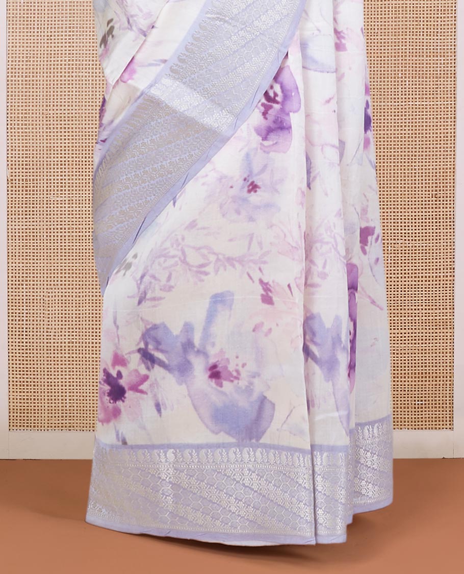 Half-white floral printed chiniya silk saree, contrast traditional zari border