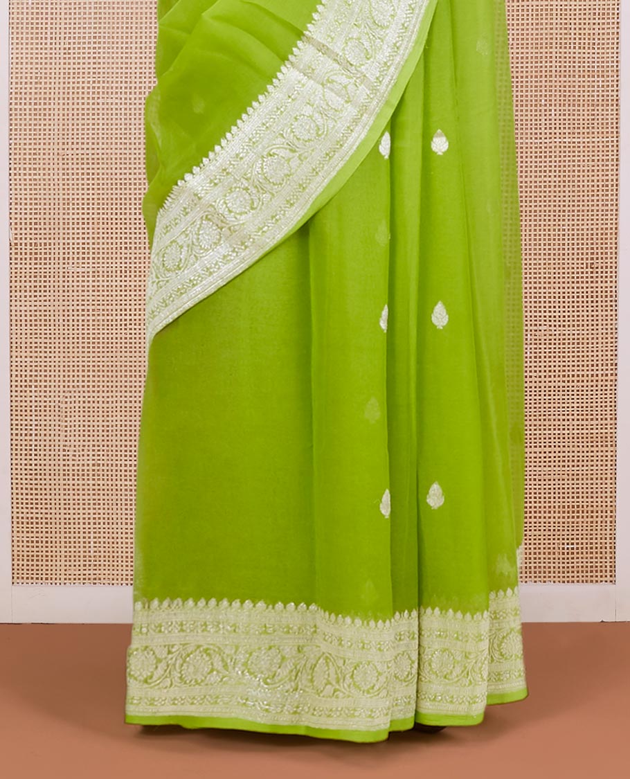 Green banaras georgette saree with zari buttas, traditional zari border of floral creeper design & floral design pallu
