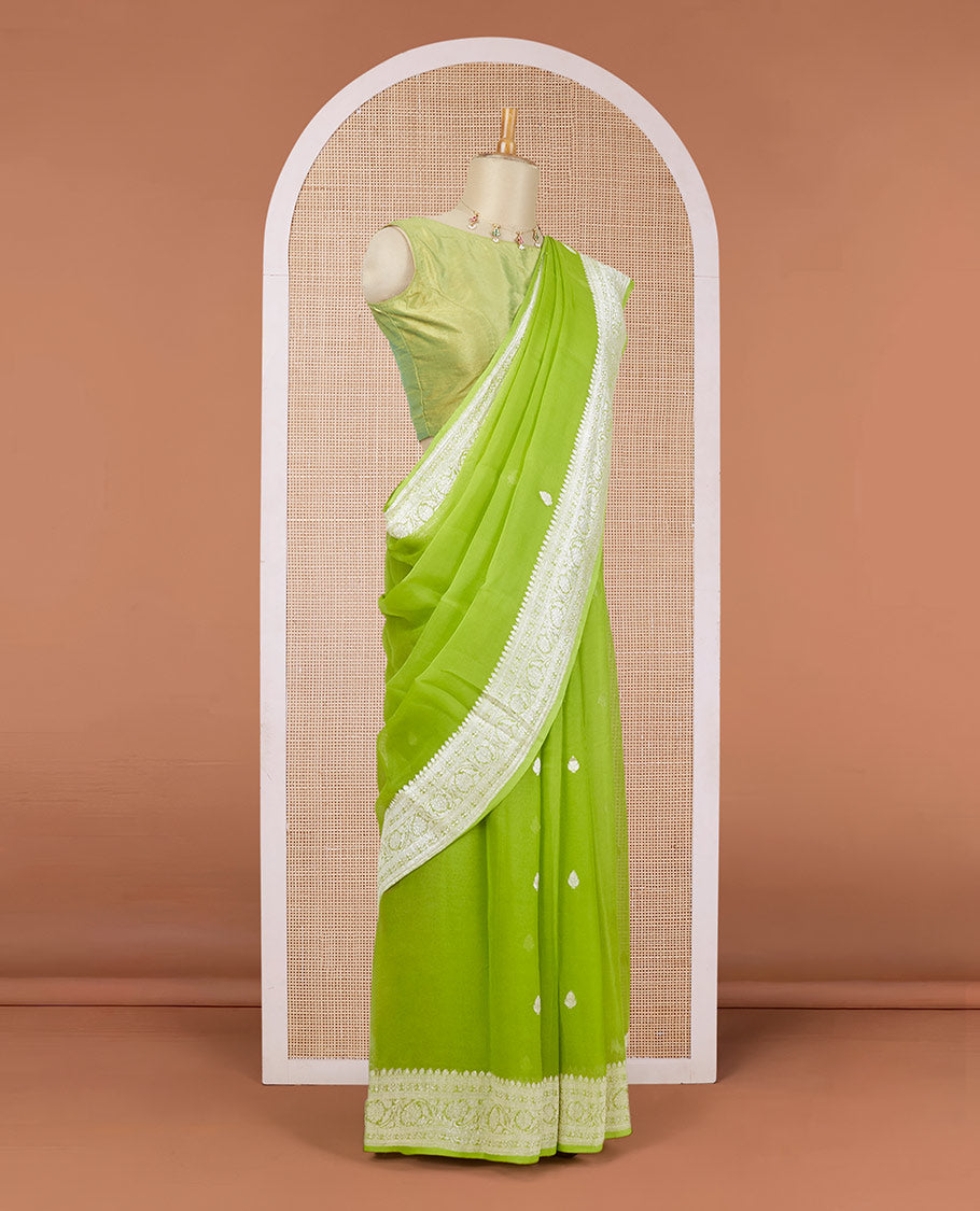 Green banaras georgette saree with zari buttas, traditional zari border of floral creeper design & floral design pallu