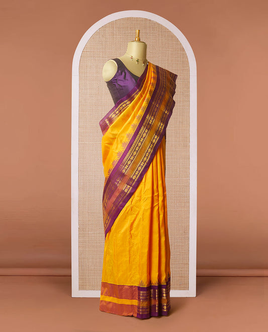 Yellow zari buttas gadwal silksaree,contrast rettai pettu traditional zari border & pallu of geometric,chevron & paisleys