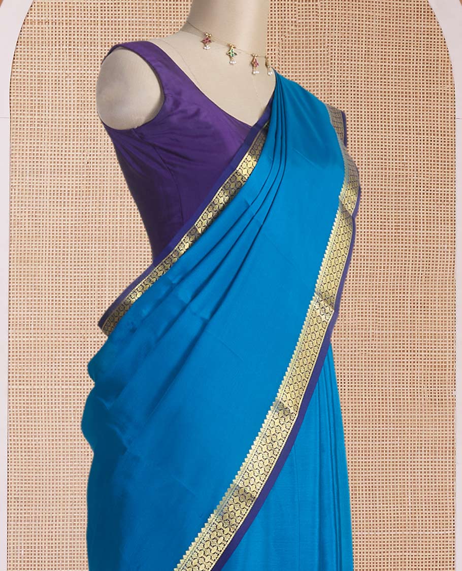 Blue plain Mysore silk saree, contrast golden zari border woven in traditional motifs & zari striped pallu