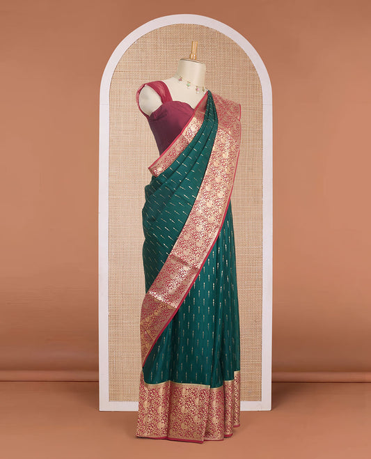Dark green zari buttas Mysore silk saree, contrast zari border & pallu of floral & peacock designs