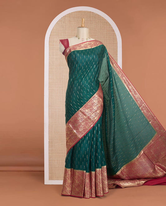 Dark green zari buttas Mysore silk saree, contrast zari border & pallu of floral & peacock designs
