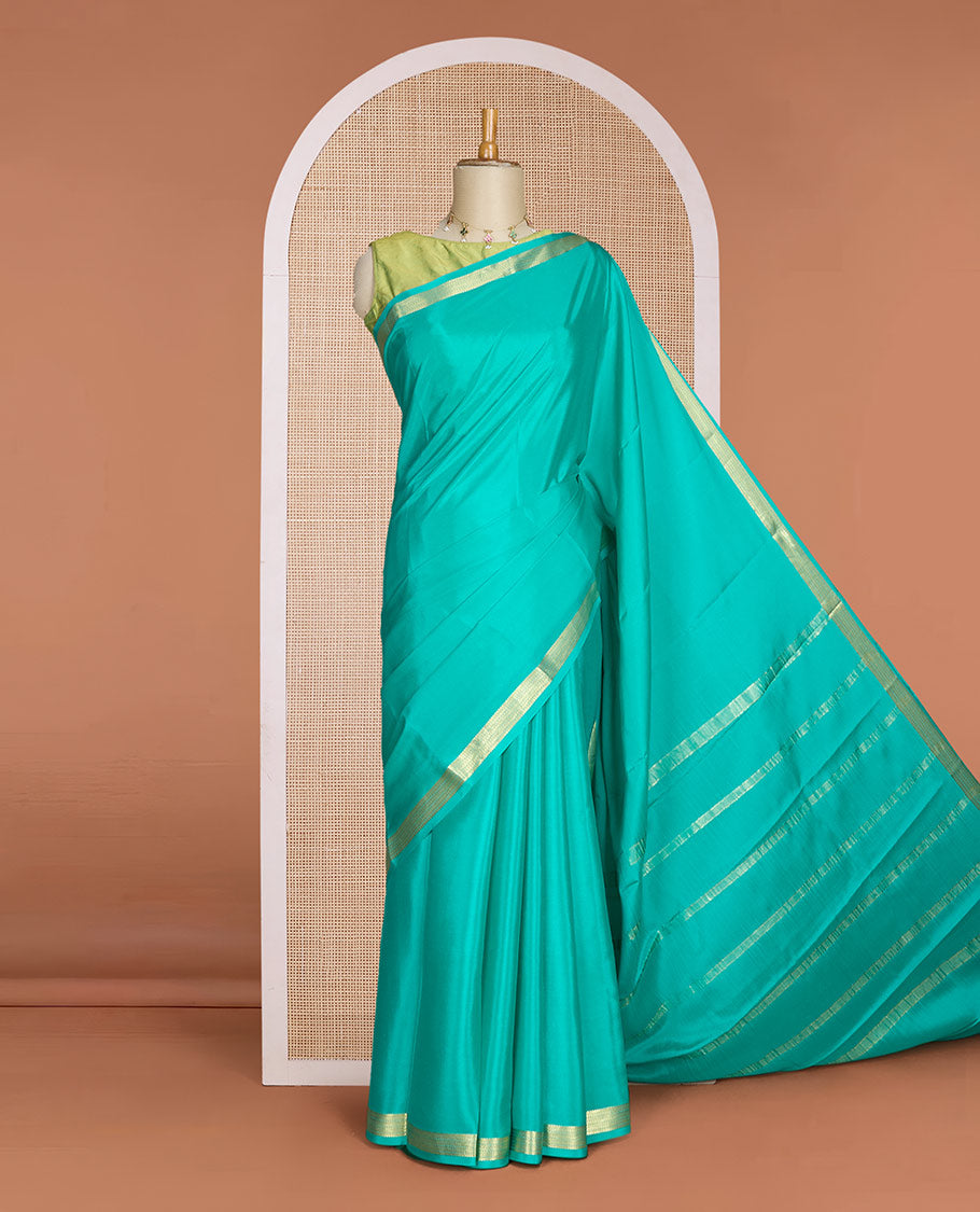 Green plain Mysore silk saree, traditional zari design border & pallu of thick zari stripes