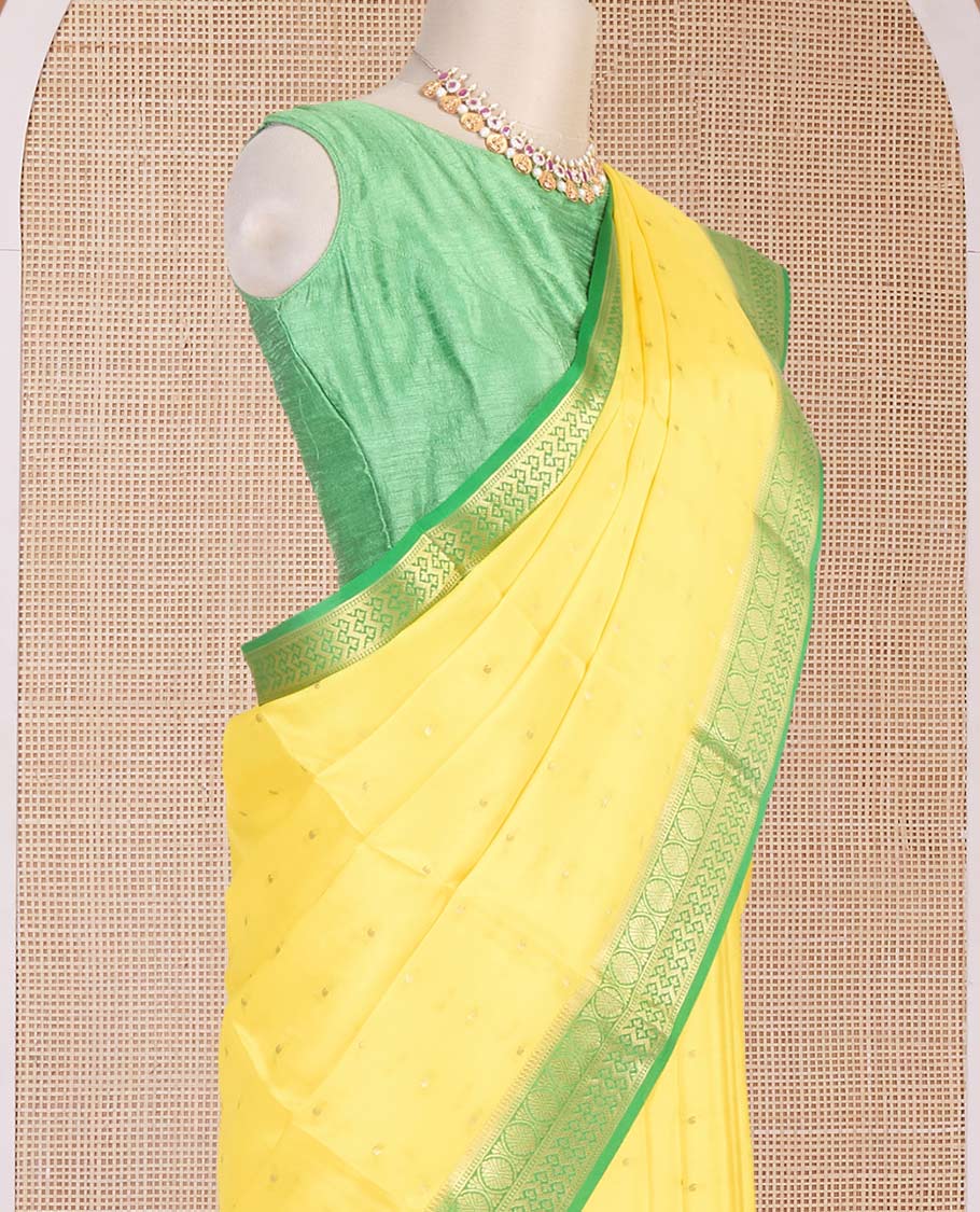 Lemon yellow zari buttas Mysore silk saree, contrast traditional zari border & intricately zari woven pallu