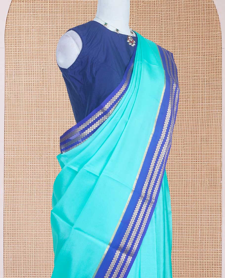 Electric blue plain design Mysore silk saree with contrast rettai pettu borders of zari designs, and zari striped pallu