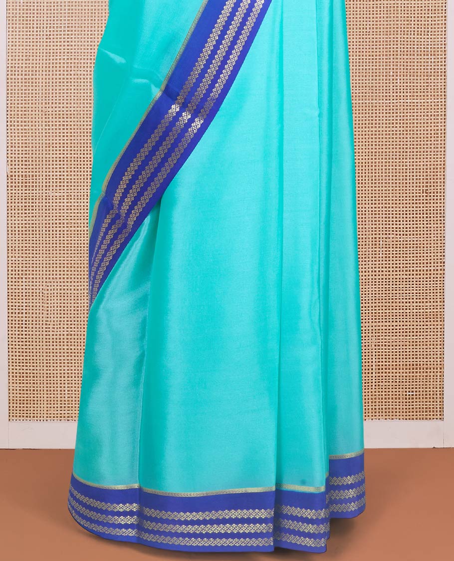 Electric blue plain design Mysore silk saree with contrast rettai pettu borders of zari designs, and zari striped pallu