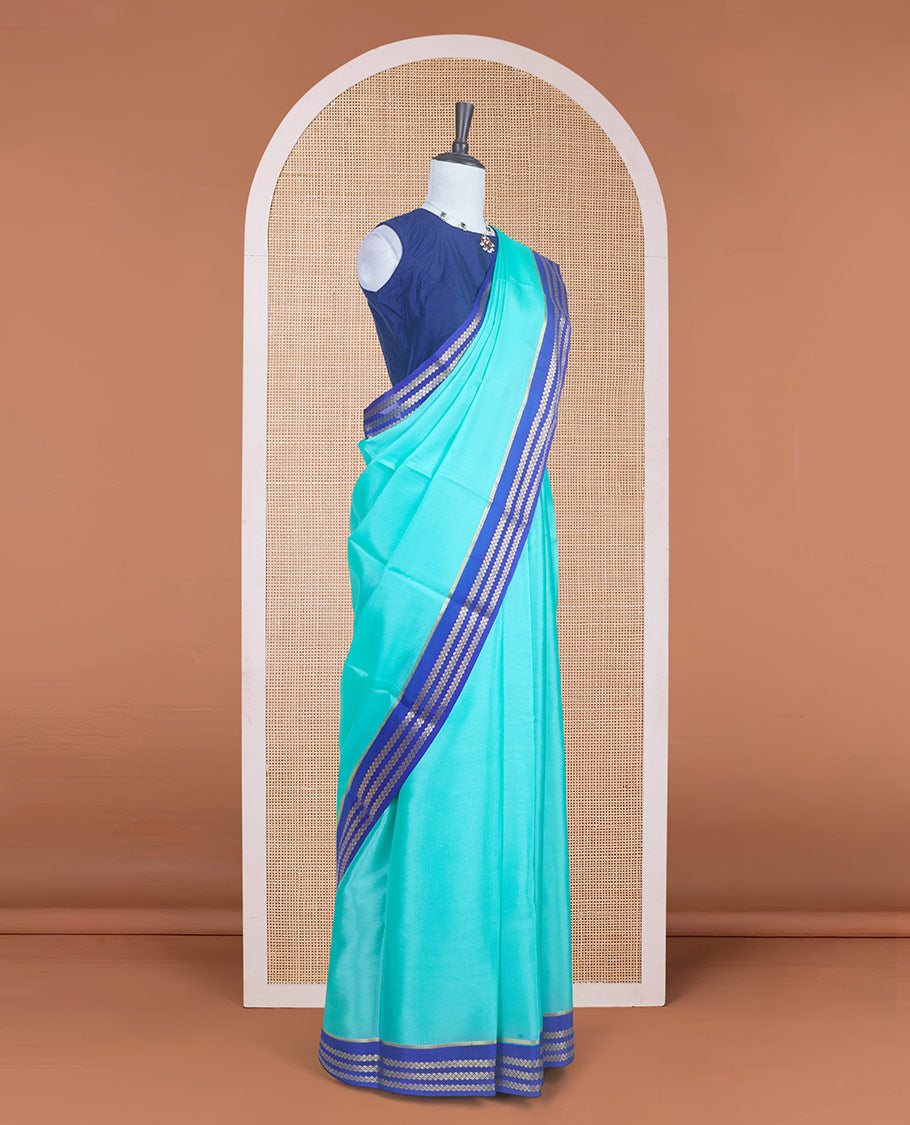 Electric blue plain design Mysore silk saree with contrast rettai pettu borders of zari designs, and zari striped pallu