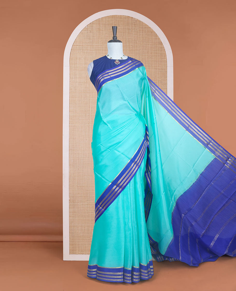 Electric blue plain design Mysore silk saree with contrast rettai pettu borders of zari designs, and zari striped pallu