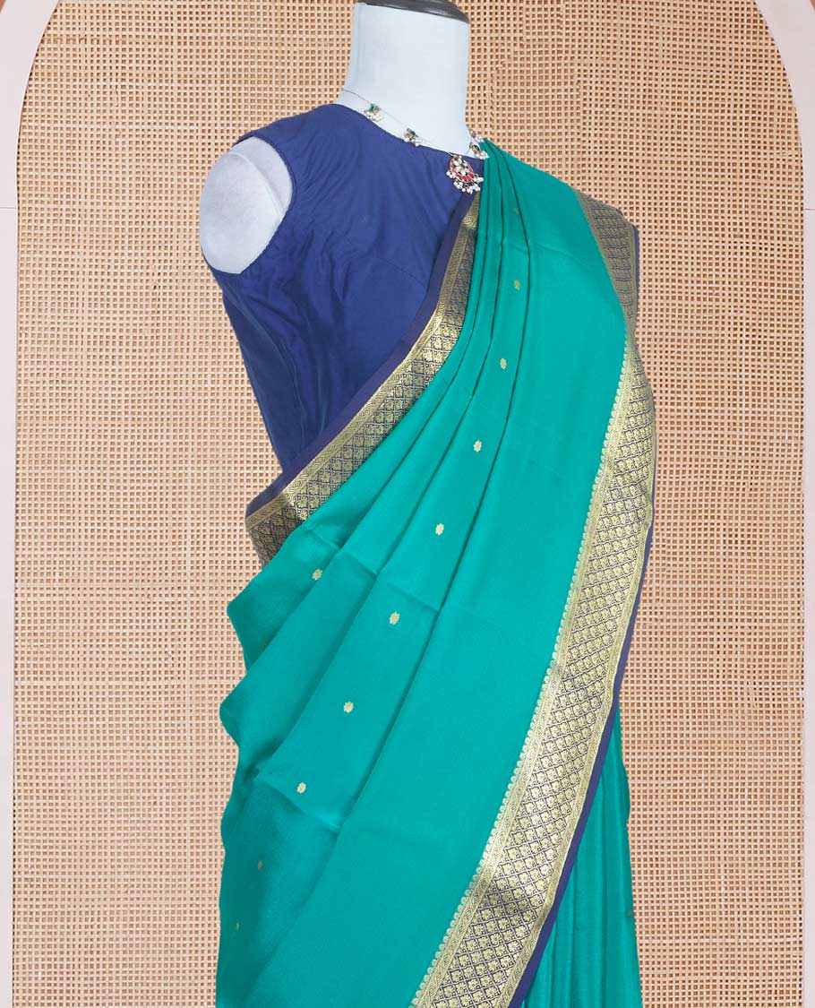 Green zari buttas Mysore silk saree with contrast zari borders of jaal design and pallu of floral jaal design