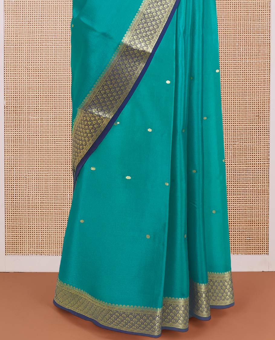 Green zari buttas Mysore silk saree with contrast zari borders of jaal design and pallu of floral jaal design