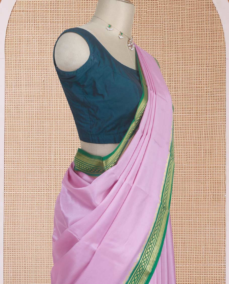 Baby pink plain Mysore silk saree with contrast geometric zari design borders and pallu of zari seer lines
