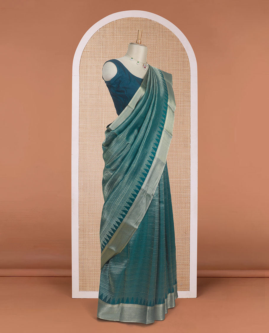 Green zari-woven geometric patterns steeped Mysore silk saree, temple traditional zari border, and jaal pallu