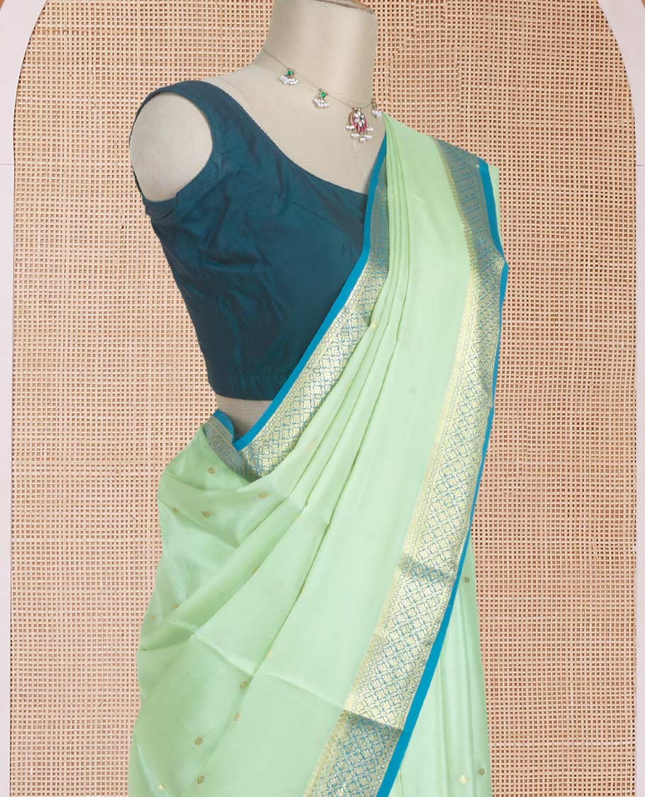 Pista green zari buttas woven Mysore silk saree, contrast jaal design zari border, and pallu adorned with jaal zari design weave