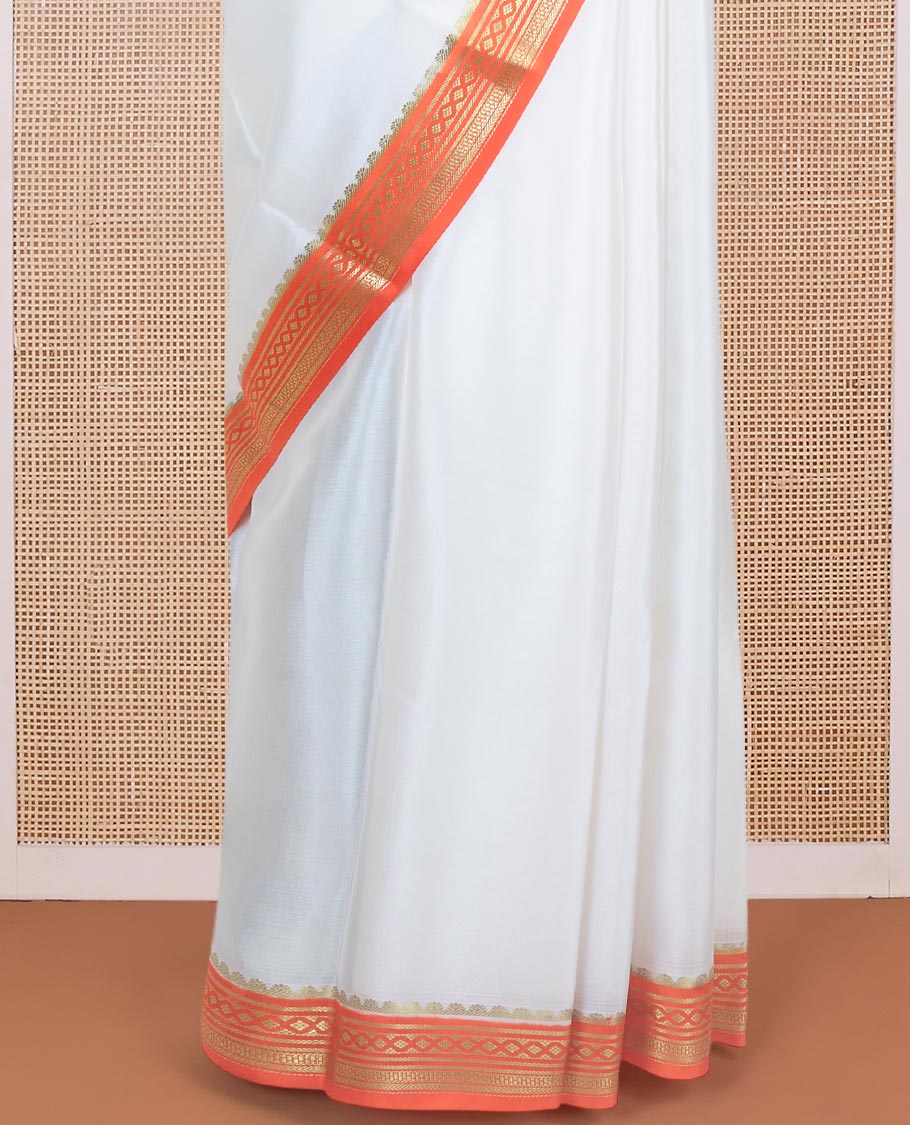 Entralling cream plain Mysore silk saree with contrast geometric zari design borders and pallu of zari seer lines