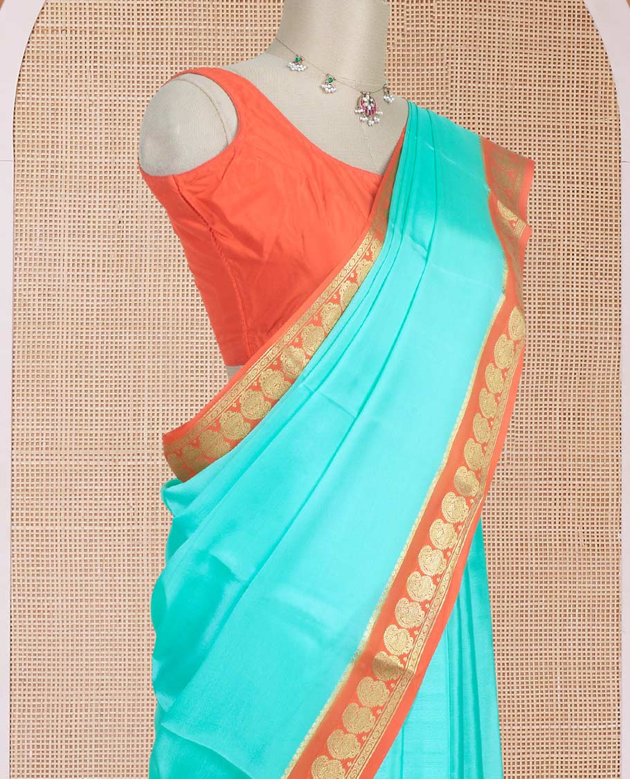 Blue plain design mysore silk saree, contrast paisley design zari border, and zari seer striped pallu