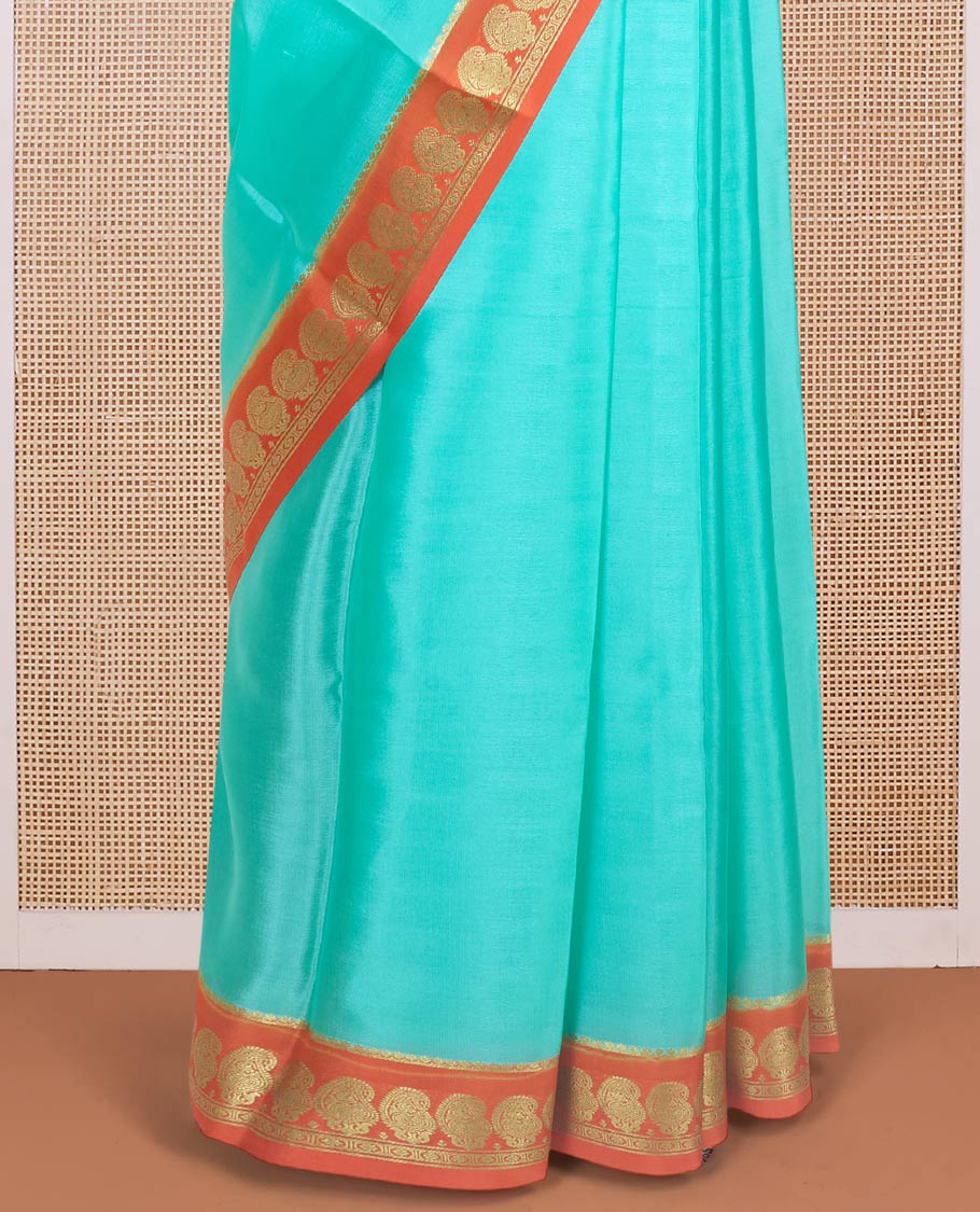 Blue plain design mysore silk saree, contrast paisley design zari border, and zari seer striped pallu