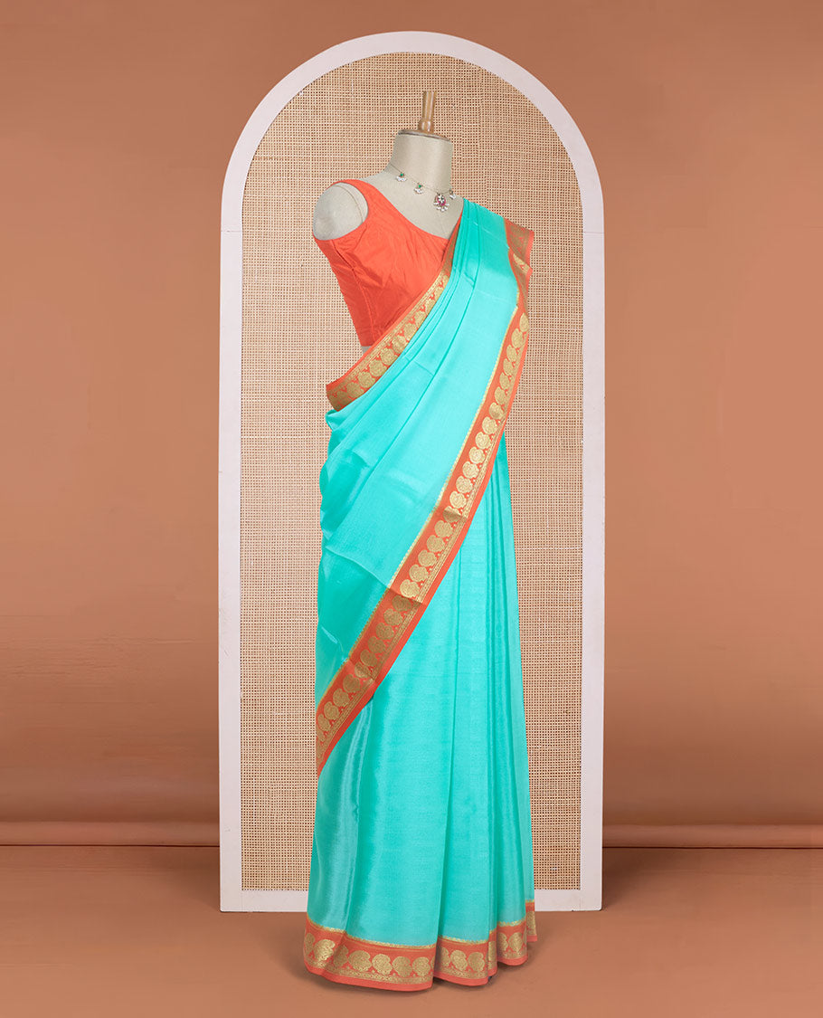Blue plain design mysore silk saree, contrast paisley design zari border, and zari seer striped pallu