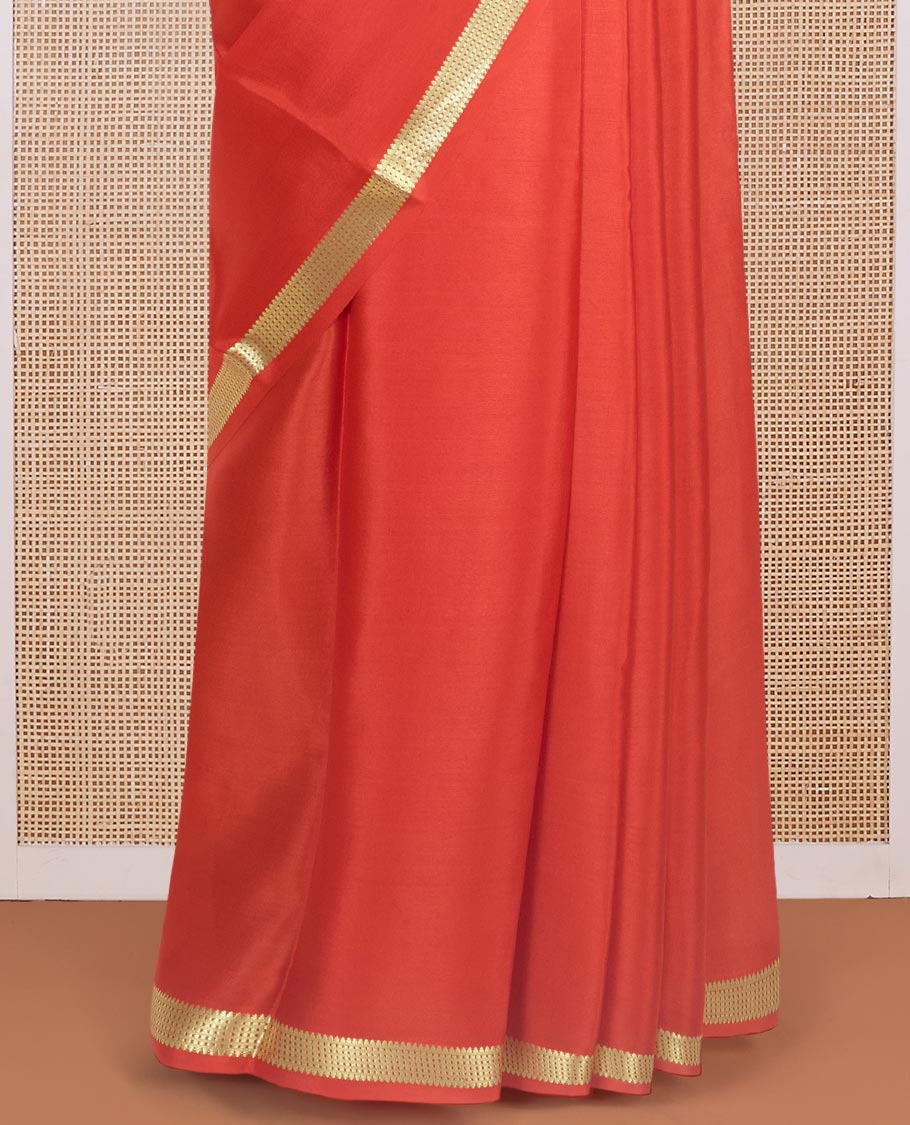 Orange plain design Mysore silk saree with traditional zari piping border, and zari striped pallu