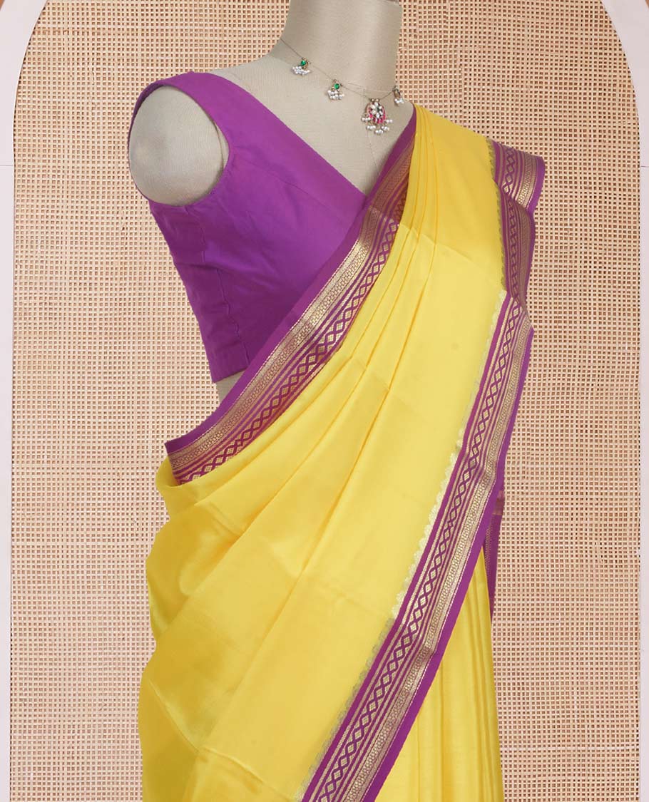 Rasamalai yellow plain Mysore silk saree with contrast geometric zari design borders and pallu of zari seer lines