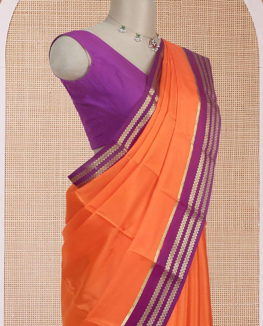 Kesari orange plain design Mysore silk saree with contrast rettai pettu borders of zari designs, and zari striped pallu