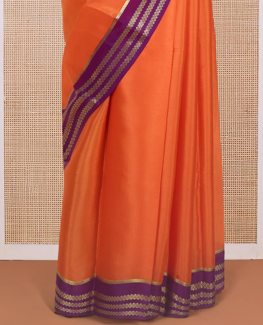 Kesari orange plain design Mysore silk saree with contrast rettai pettu borders of zari designs, and zari striped pallu