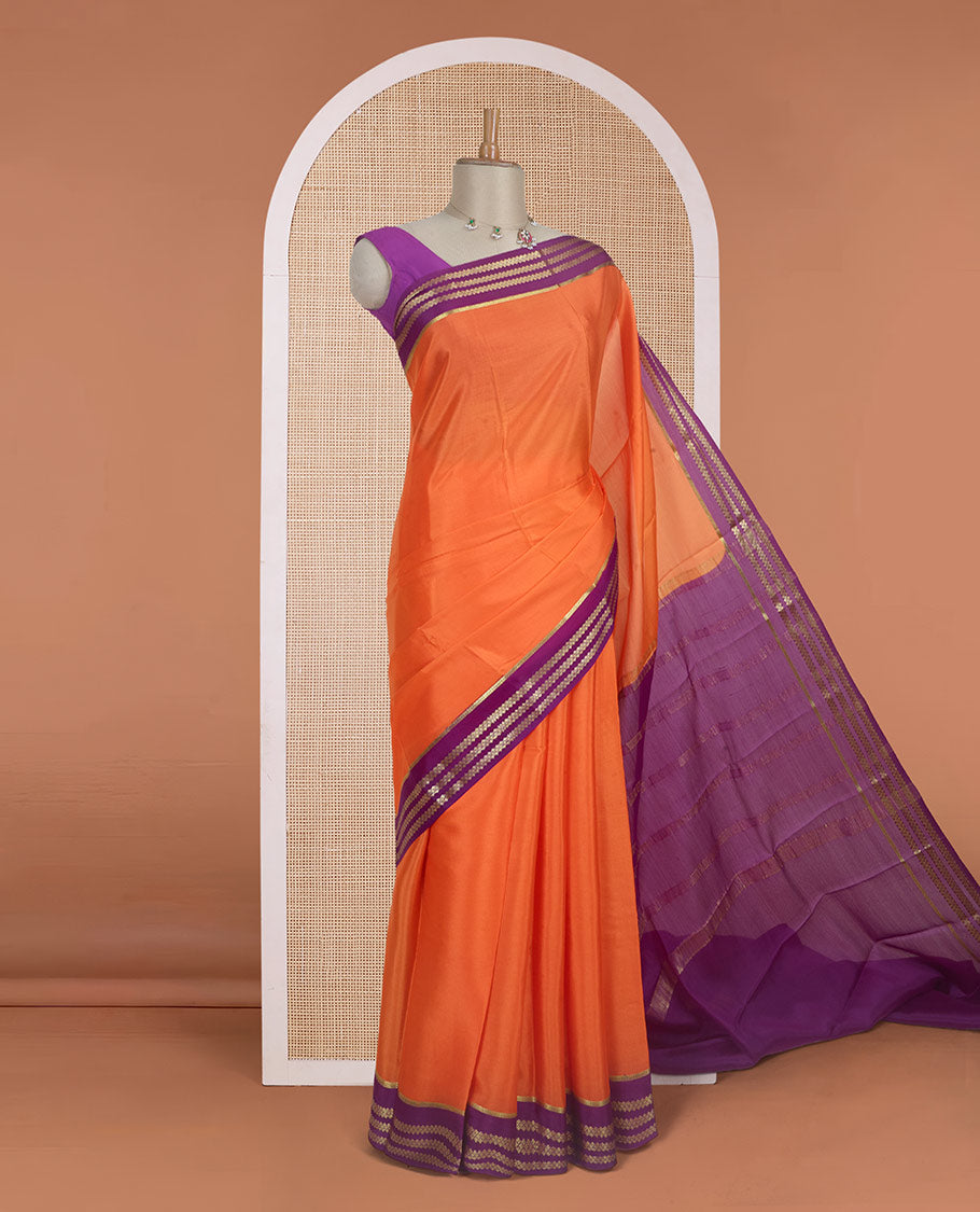 Kesari orange plain design Mysore silk saree with contrast rettai pettu borders of zari designs, and zari striped pallu
