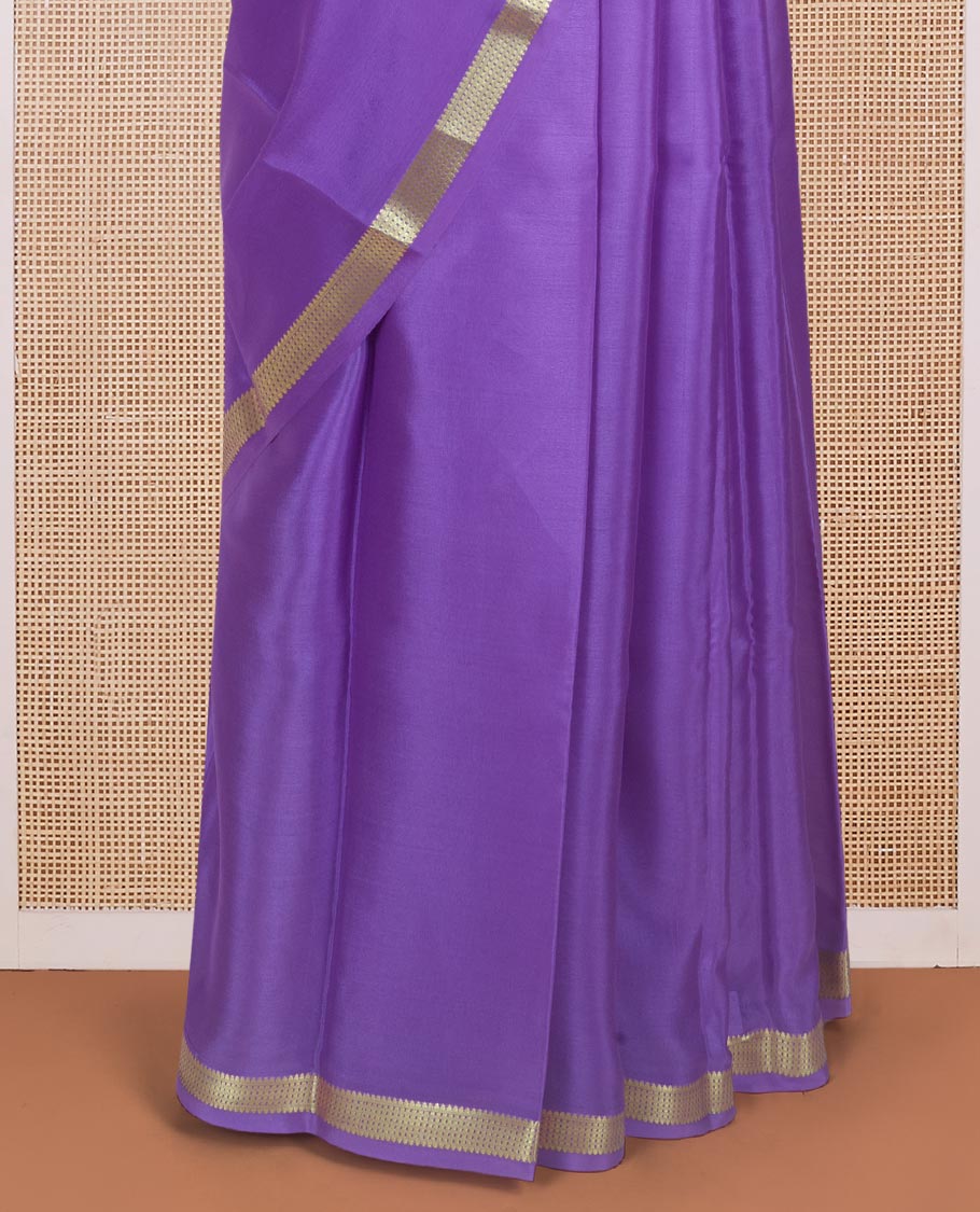 Purple plain Mysore silk saree with traditional zari design borders and pallu of zari seer lines
