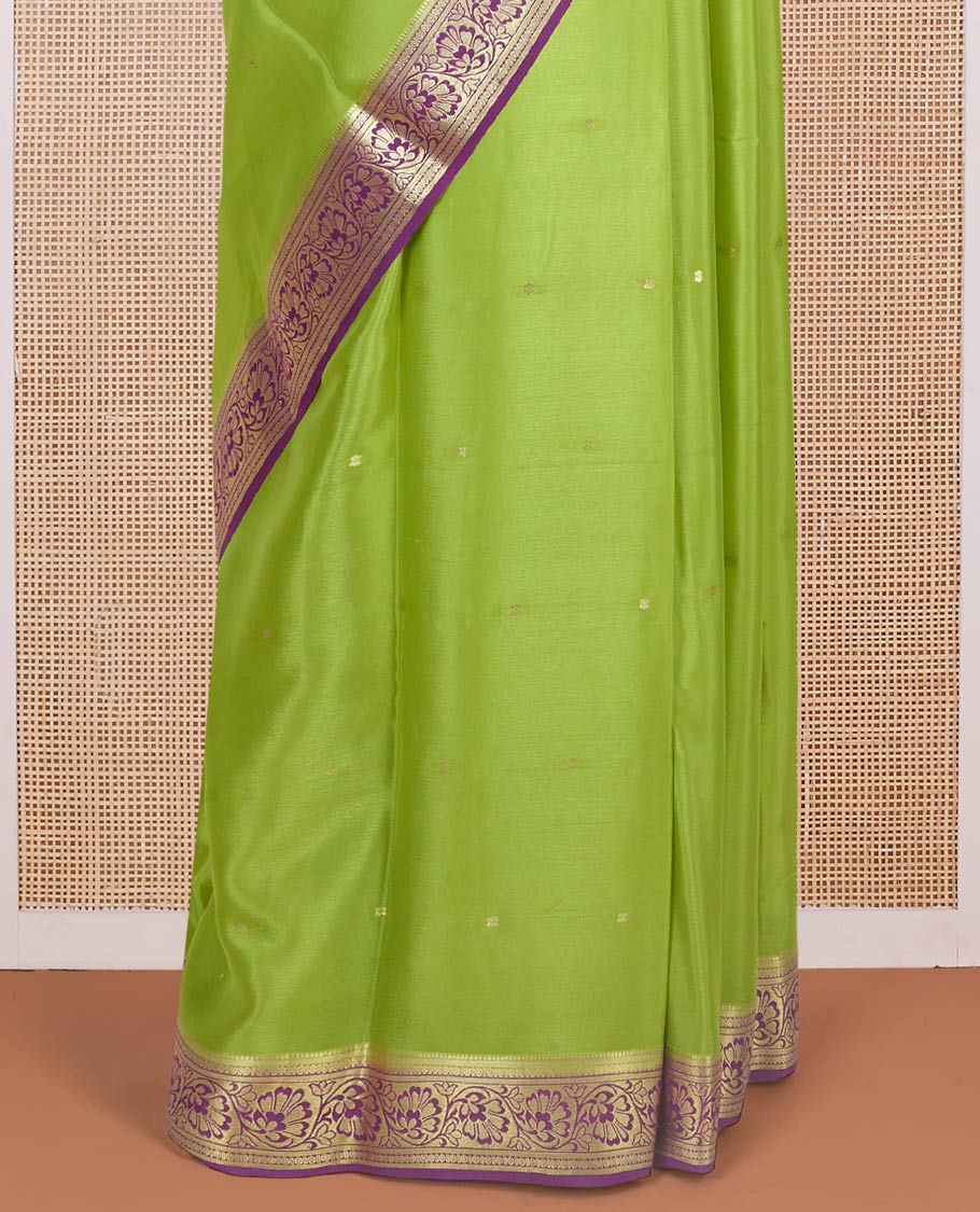 Parrot green zari buttas Mysore silk saree, contrast traditional zari border adorned with floral creeper design, and floral jaal pallu