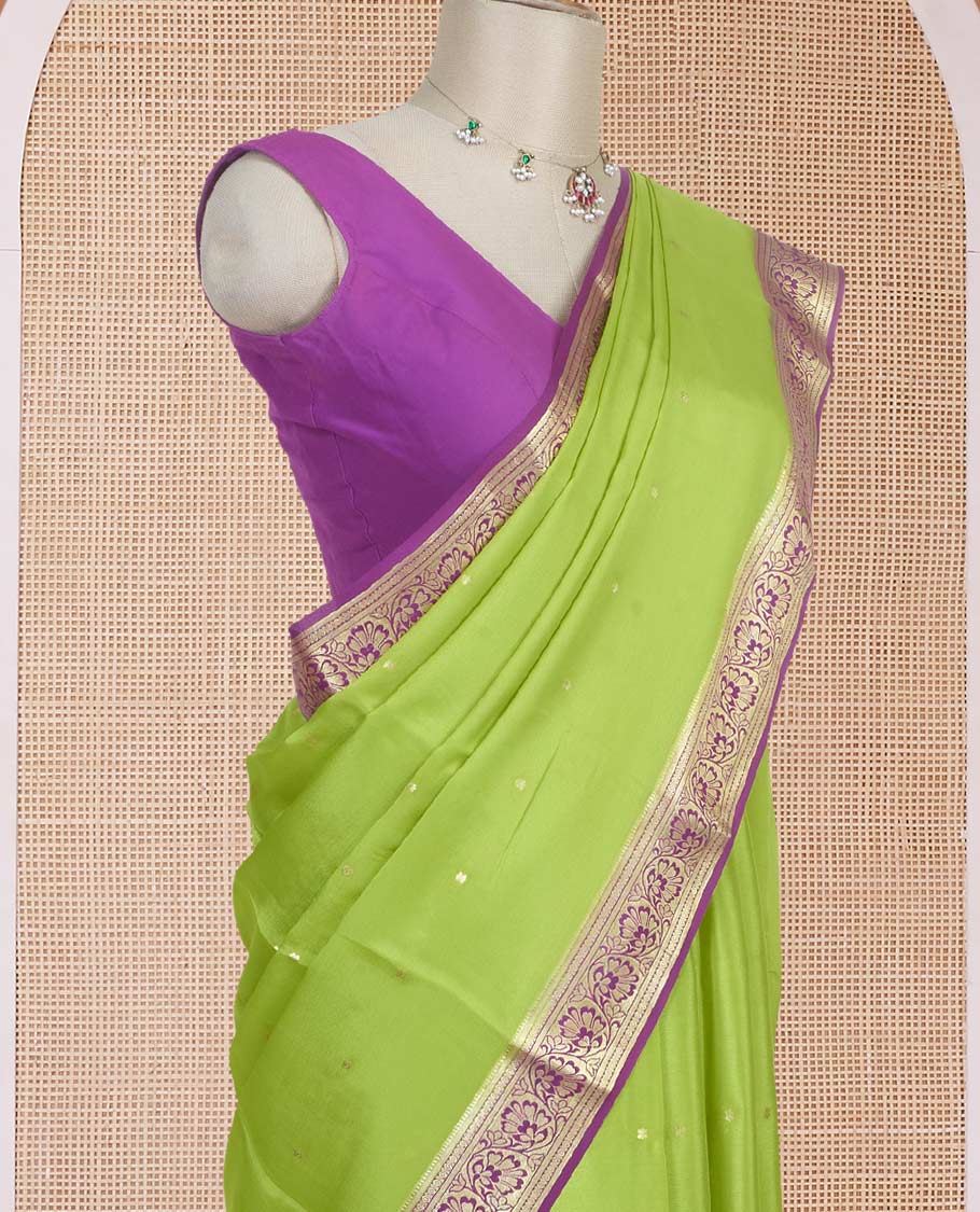 Parrot green zari buttas Mysore silk saree, contrast traditional zari border adorned with floral creeper design, and floral jaal pallu