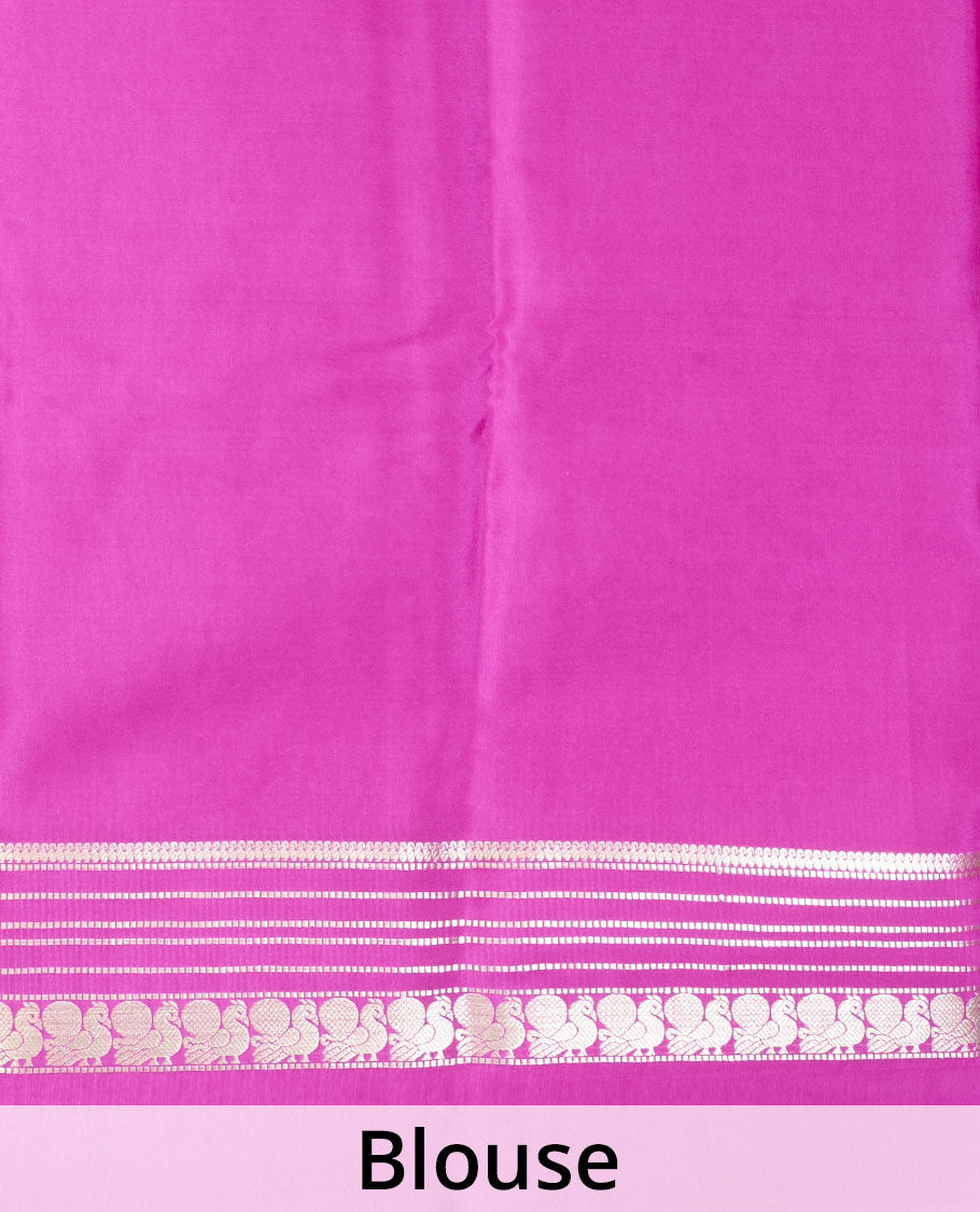 Rani pink paisley buttas Mysore silk saree, traditional zari border of peacock designs, and pallu steeped with paisleys