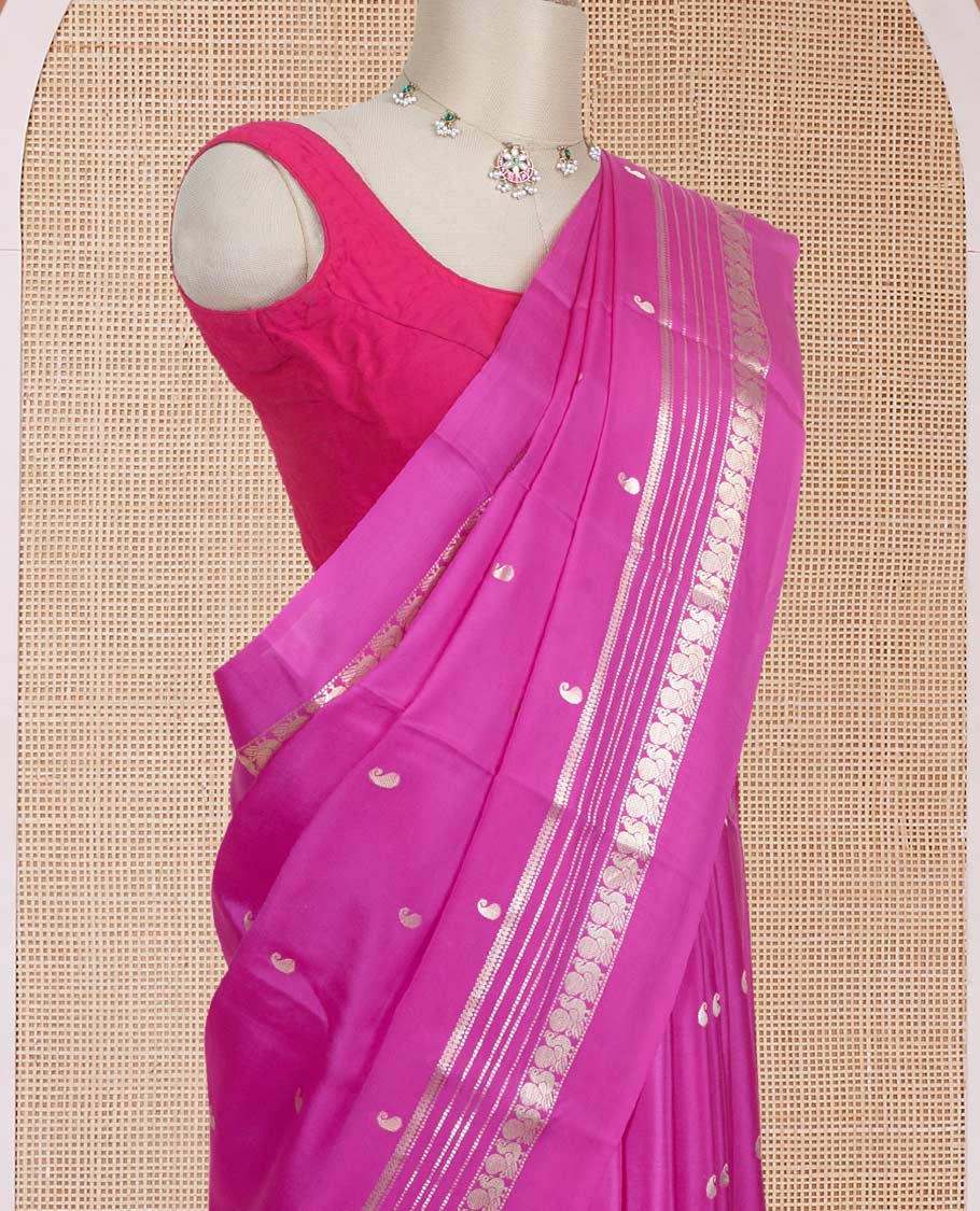 Rani pink paisley buttas Mysore silk saree, traditional zari border of peacock designs, and pallu steeped with paisleys