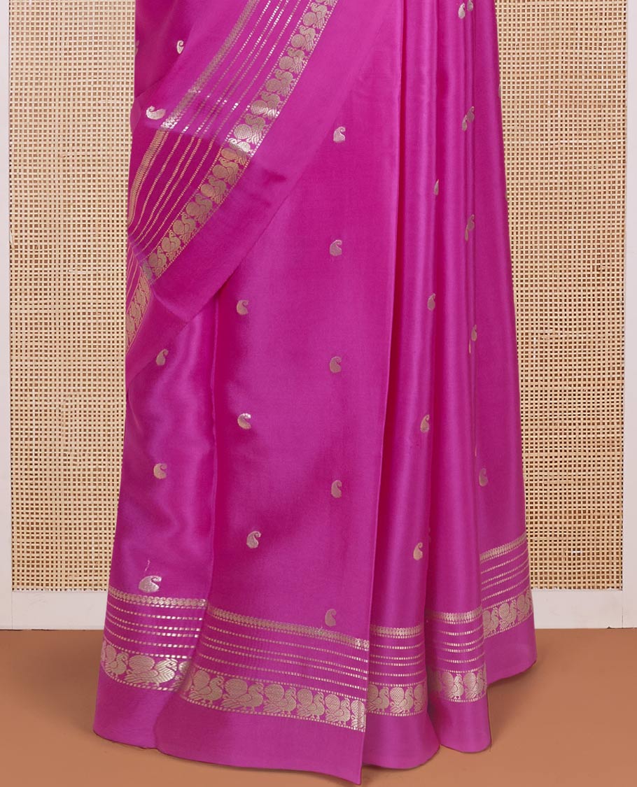 Rani pink paisley buttas Mysore silk saree, traditional zari border of peacock designs, and pallu steeped with paisleys