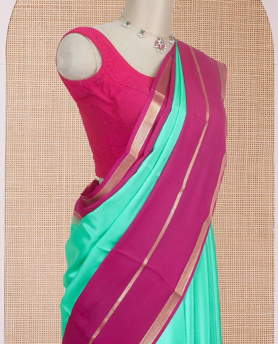 Turquoise plain design Mysore silk saree, contrast rettai pettu borders of zari designs, and pallu of zari stripes & temple design
