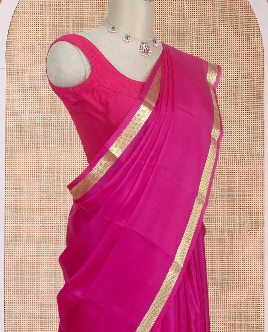Dark rani pink plain design Mysore silk saree with traditional zari design borders, and zari striped pallu