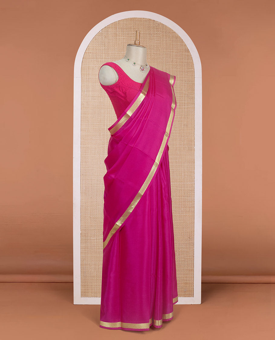 Dark rani pink plain design Mysore silk saree with traditional zari design borders, and zari striped pallu