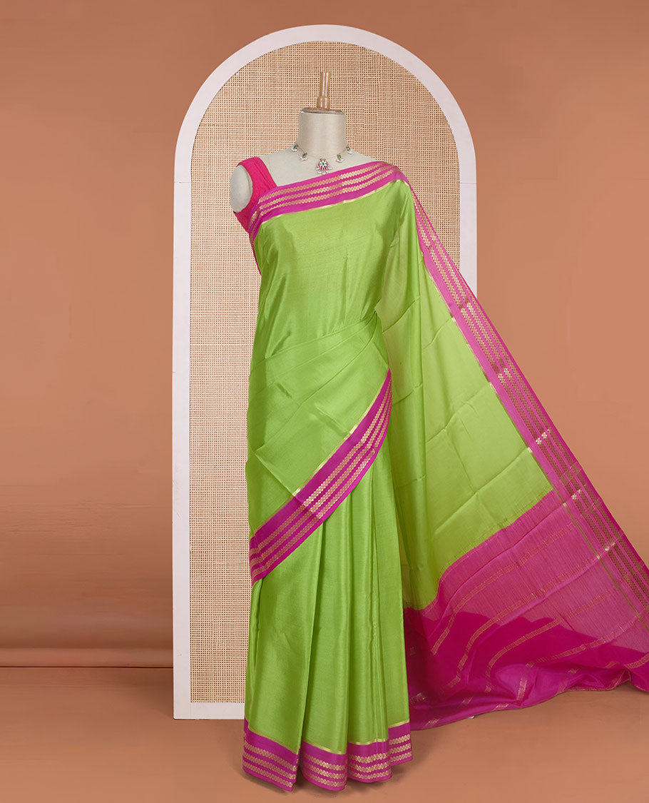 Parrot green plain design Mysore silk saree with contrast rettai pettu borders of zari designs, and zari striped pallu