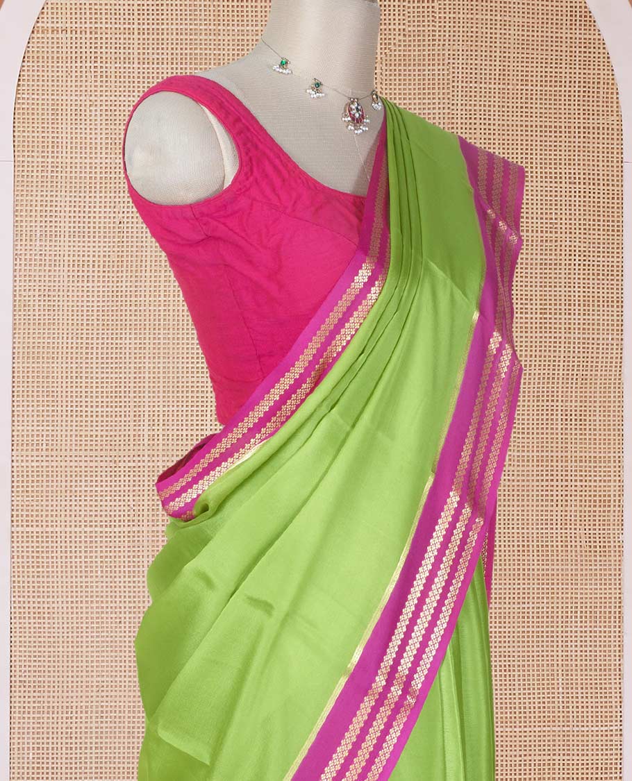Parrot green plain design Mysore silk saree with contrast rettai pettu borders of zari designs, and zari striped pallu