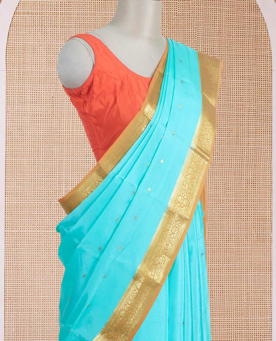 Powder blue zari buttas Mysore silk saree, contrast floral zari border, and zari design palllu