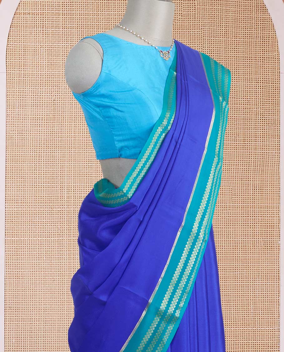 Blue plain design Mysore silk saree, contrast traditional rettai pettu border, and zari stripes pallu