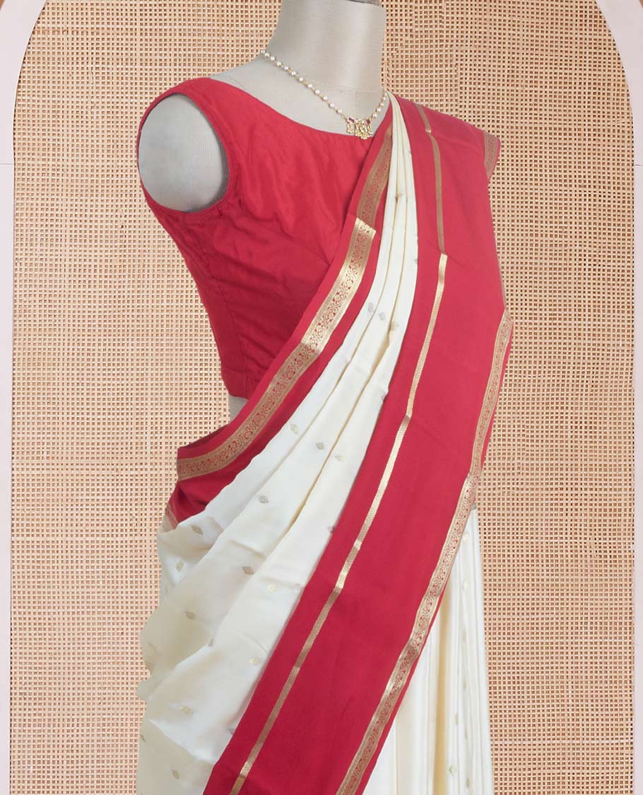 Cream zari buttas steeped Mysore silk saree, contrast rettai pettu traditional zari border, and pallu of temple design in golden zari