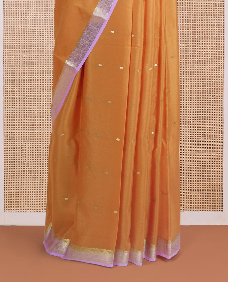 Orange zari buttas steeped Mysore silk saree, contrast traditional zari border, and pallu of zari stripes