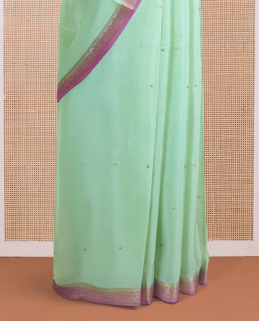 Light pista green zari buttas Mysore silk saree, contrast floral creeper zari border, and zari striped pallu