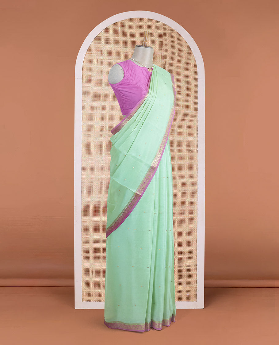 Light pista green zari buttas Mysore silk saree, contrast floral creeper zari border, and zari striped pallu